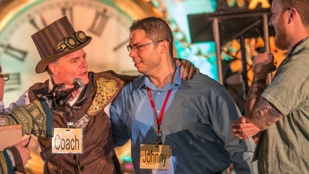 Guest standing up participating in murder mystery dinner show