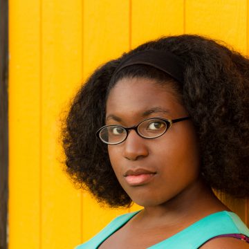Headshot Image of Jest Murder Mystery Entertainer Akia Sembly