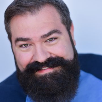 Headshot Image of St. Louis Murder Mystery Entertainer Ed Reggi