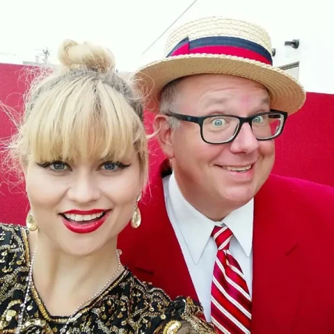 1920's themed Murder Mystery entertainers pose for murder mystery party photo