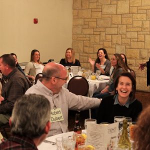 Guest enjoy murder mystery dinner for company office party
