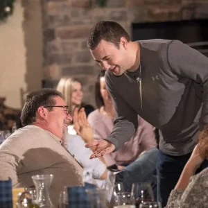 Guests interacting at Jest Murder Mystery Co. murder mystery dinner party