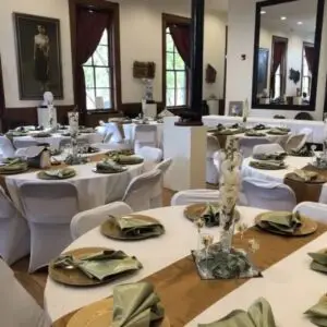 Banquet-style dining setup inside a historic St. Louis event venue prepared for a private group event